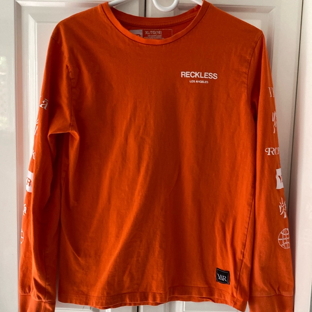 Boy’s orange Young & Reckless long sleeve top